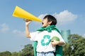 Young superhero boy with recycle symbol make announcement. Gyre