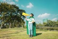 Young superhero boy with recycle symbol make announcement. Gyre