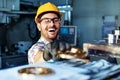 Supervisor doing quality control and production check in factory Royalty Free Stock Photo