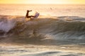 Young surfer enjoying waves Royalty Free Stock Photo