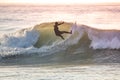 Young surfer enjoying waves Royalty Free Stock Photo