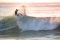 Young surfer enjoying waves Royalty Free Stock Photo