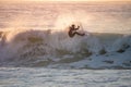 Young surfer enjoying waves Royalty Free Stock Photo