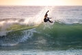 Young surfer enjoying waves Royalty Free Stock Photo