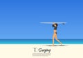 Young surfer girl carrying surfboard on her head and walking on white sand beach Royalty Free Stock Photo