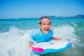 Young surfer girl