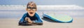 Young surfer, happy young boy at the beach with surfboard BANNER, LONG FORMAT Royalty Free Stock Photo