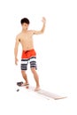 Young surfer practice surfing pose Royalty Free Stock Photo