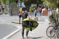 young surfer with surf board in the city