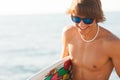 Young surfer about to get into the sea Royalty Free Stock Photo