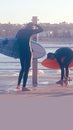 Young surfers after a big day surfing the Bondi waves, Sydney NSW Australia