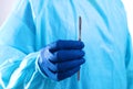 Young surgeon holding a scalpel. Ready for operation Royalty Free Stock Photo