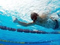 Young swimmer in pool