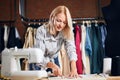 Young tailor working with sewing pattern Royalty Free Stock Photo