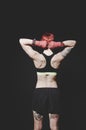 Young tattooed woman boxer back view close up portrait Royalty Free Stock Photo