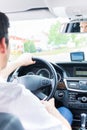 Young Taxi driver driving his car