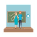 Young teachers couple with chalkboard in classroom scene