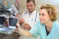 Young team doctors having coffee break at hospital Royalty Free Stock Photo