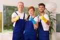 Young team of house cleaners