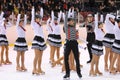 Young team from a school of skating on ice performance