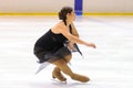 Young team from a school of skating on ice performs, disguised as sailors