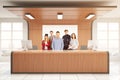 Young team at wooden reception Royalty Free Stock Photo