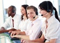 Young team working together in an office Royalty Free Stock Photo