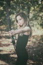 Teen girl with bow and arrow Royalty Free Stock Photo