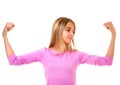 Young teen girl showing her muscular arm for feminine and independent strength,isolated Royalty Free Stock Photo