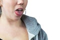 Young teen girl with tongue piercing and hoodie Royalty Free Stock Photo