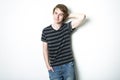 Young teenage boy being photographed in a studio. Royalty Free Stock Photo