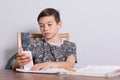 Young teenage boy doing his homework Royalty Free Stock Photo