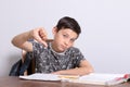 Young teenage boy doing his homework Royalty Free Stock Photo