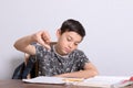 Young teenage boy doing his homework Royalty Free Stock Photo