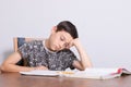 Young teenage boy doing his homework Royalty Free Stock Photo