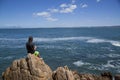 Young teenage boy fishing by the sea Royalty Free Stock Photo