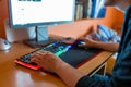Young teenage boy playing video games on computer Royalty Free Stock Photo