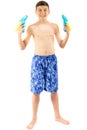 Young teenage boy playing with water guns Royalty Free Stock Photo