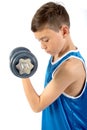 Young teenage boy using dumbbells Royalty Free Stock Photo