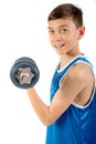 Young teenage boy using dumbbells Royalty Free Stock Photo