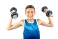 Young teenage boy using dumbbells Royalty Free Stock Photo