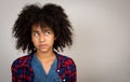 Young Teenage Girl With Afro Hair Thinking Royalty Free Stock Photo