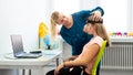 Young teenage girl and child therapist during EEG neurofeedback session. Electroencephalography concept. Royalty Free Stock Photo