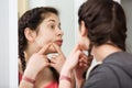 Girl cleaning pores Royalty Free Stock Photo