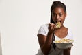 Young teenage girl eating a salad Royalty Free Stock Photo