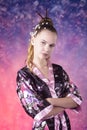 Young teenage girl in floral kimono in studio Royalty Free Stock Photo