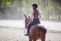 Young teenage girl riding her horse at training Royalty Free Stock Photo