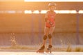 Young teenage girl speed skating on rollerdrome Royalty Free Stock Photo