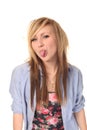 Young teenage girl sticking out tongue Royalty Free Stock Photo