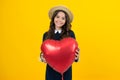 Young teenager child girl with balloon heart shape. Happy Valentines Day. Love and pleasant feelings concept. Royalty Free Stock Photo